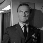 Jonathan Harris as Colonel Zachary Smith